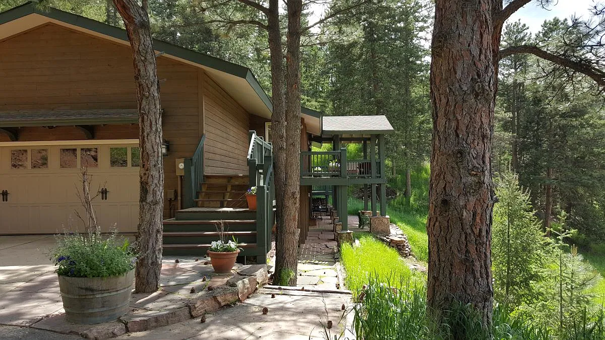 Private entrance surrounded by trees